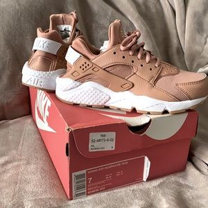 Dusted clay Huarache Nike shoes.